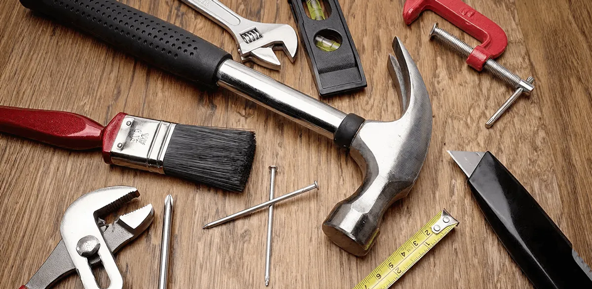 Handyman tools laid out for home repair and maintenance work in Bloomington, IN