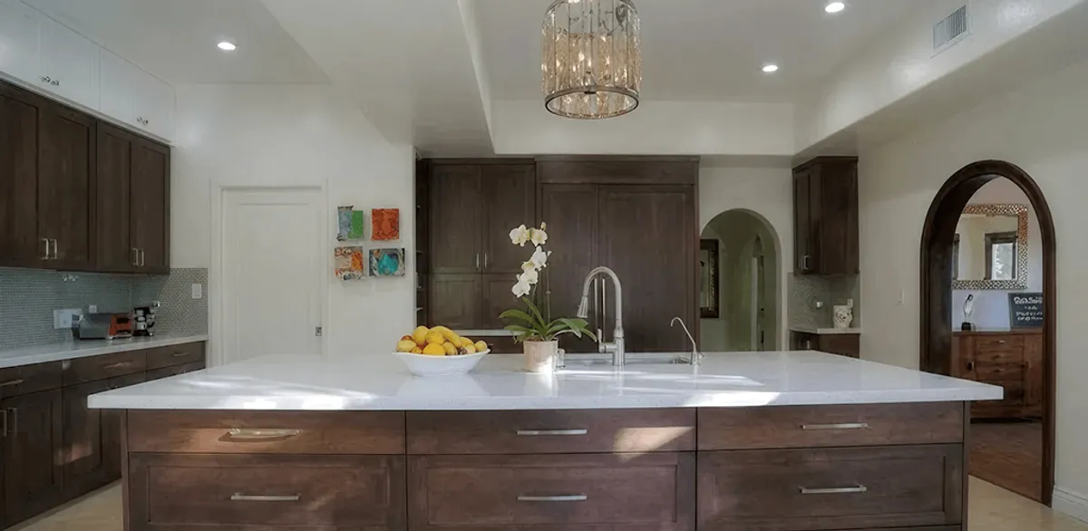 Cabinet refacing project with updated kitchen cabinets and island in Bloomington, IN